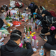 Pro-democracy protesters make molotov cocktails at the Hong Kong Polytechnic University, in Hong Kong on November 14, 2019.